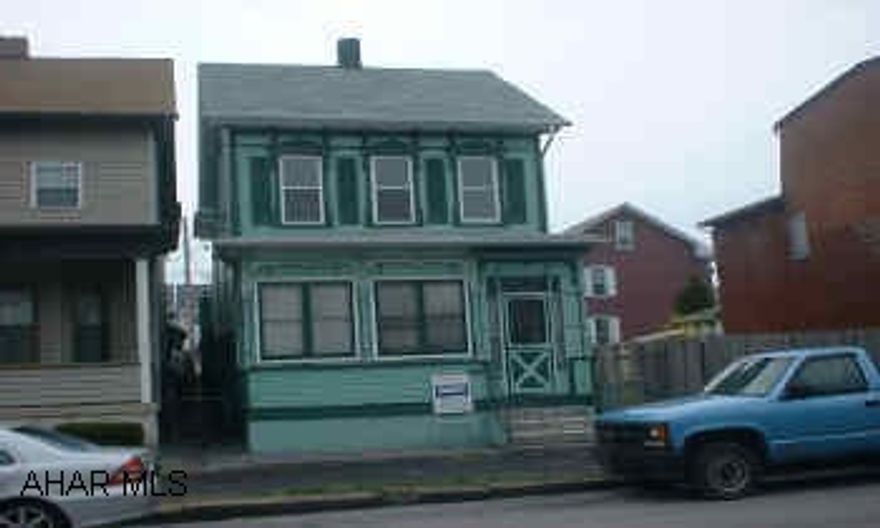 THREE BEDROOM HOME WITH 2 CAR GARAGE, FULL BATH AND WOOD BURNER.  THIS HOME NEEDS CARPETING AND MINOR REPAIRS.  TAKE A LOOK!