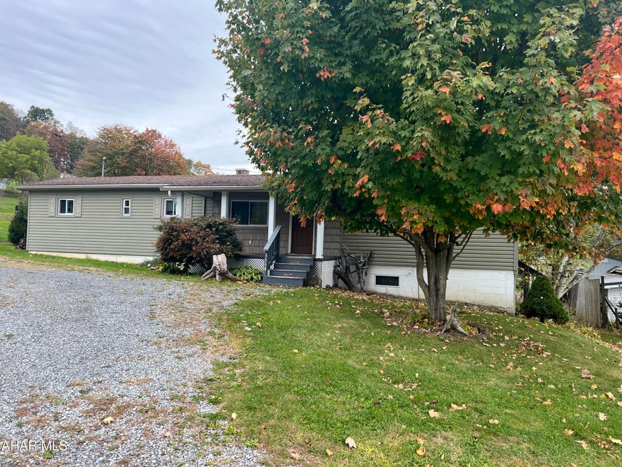 2 or 3 bedroom mobile home on a nice lot. The home has additions including an office, family room and bedroom. The home has been remodeled and includes a large eat in kitchen with updated cabinets, large living room and bath. There is a partial basement with concrete floor and block walls. The roof is a gable shingle type  and there is a front porch and rear deck. There are 2 utility sheds in the back yard. Great home for the money!