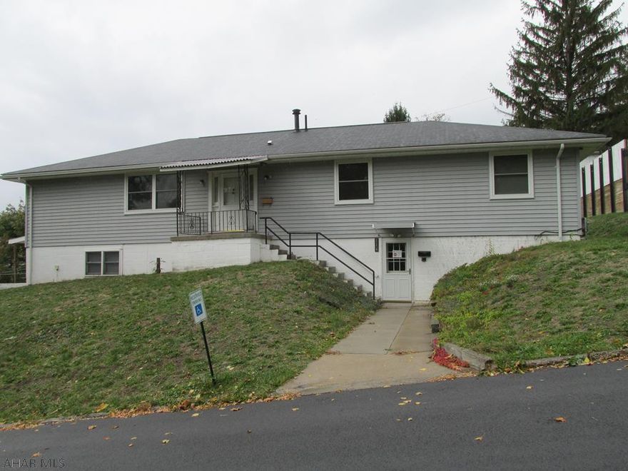 Spacious Ranch home - set up as a group home at present - huge potential well maintained, make it your own.  Currently duplexed each level has two bathrooms (4 total).  Offices, kitchens, bedrooms, laundry facilities on both levels. Handicap accessible.