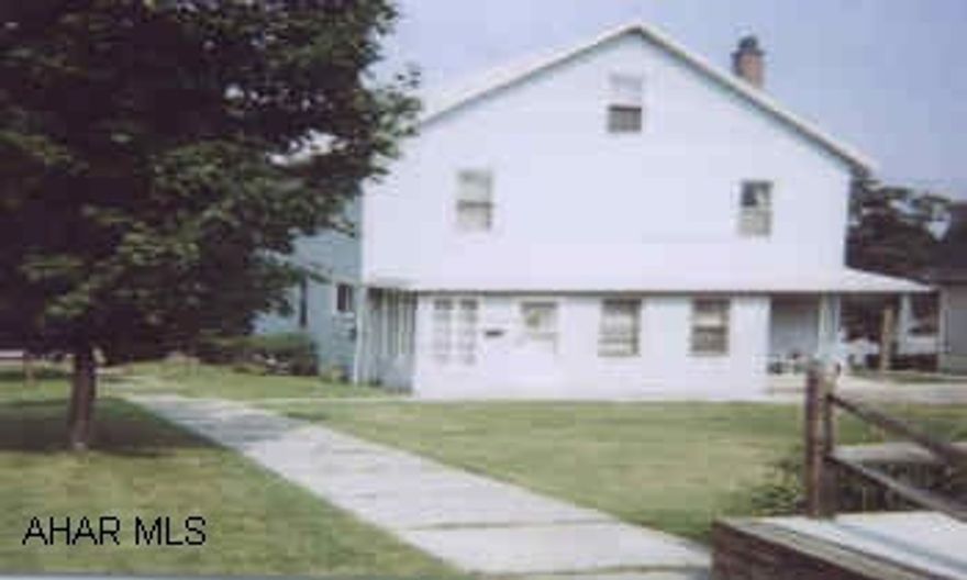 VERY WELL MAINTAINED. SPACIOUS DUPLEX. NEW ROOF, SIDING. NICE LOT. GAR W/DECK, HEAT & ELECT. BLACK TOP DRIVE.