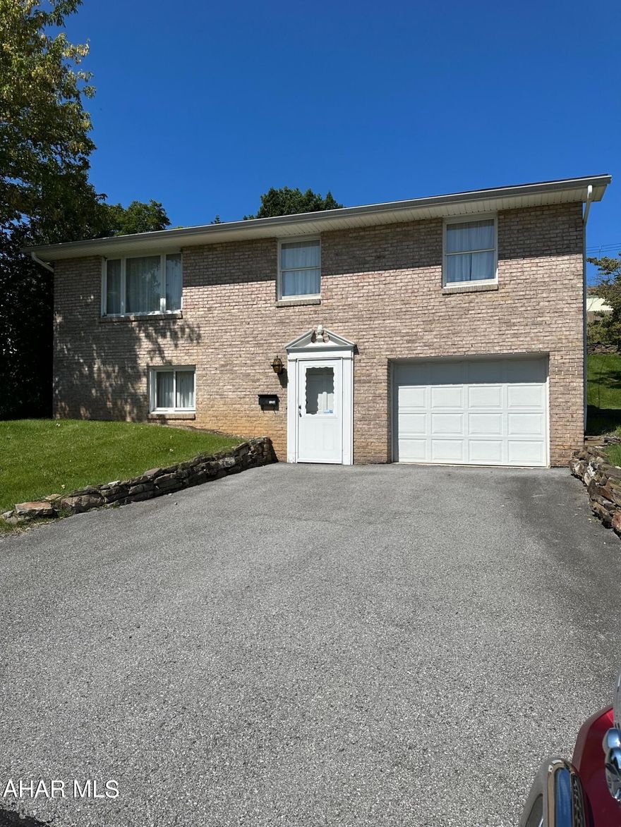 Nice raised ranch style home in great location.  Newer furnace and hot water tank.   Central Air. 
 Screened porch.   One car integral garage.