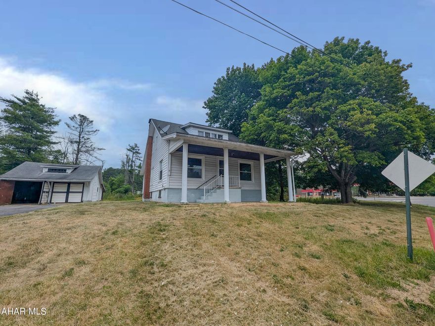 Tyrone/Bald Eagle area 1.5 story Cape Cod home on .42 acre lot. Huge formal living room, formal dining room, eat-in kitchen w/ breakfast nook, one bedroom and full bath all on the first floor. Second floor has 2 bedrooms plus ample storage cubbyholes. Over-sized 2 car detached garage with attached storage shed. Enclosed rear porch, covered front porch and insulated glass windows. AS-IS sale, seller will make no repairs.