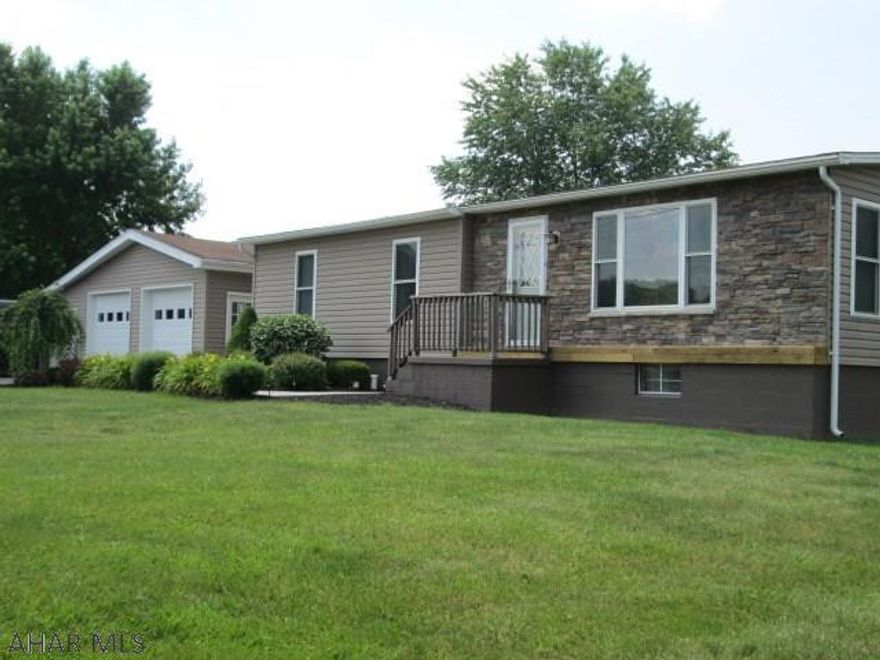 Hollidaysburg. One story living with all the upgrades. Move in condition starting with newer insulation, dry wall throughout, new windows, new flooring, new furnace, new C/A and newer appliances. This private setting also features a 3 car garage.