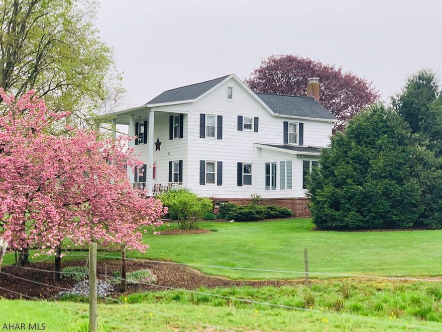 Relax and enjoy the peace and solitude that surrounds this meticulously maintained 65 acre property set in the foothills of the Allegheny Mountains.  A babbling stream provides a wonderful oasis for abundant wildlife.  This exceptional sunroom provides magical views to enjoy meals with friends and family while entertaining on the large backyard entertainment area.  A bank barn with concrete block foundation, milk house transformed into a studio/office with shower and a huge oversized 4 car garage complete this fabulous property.