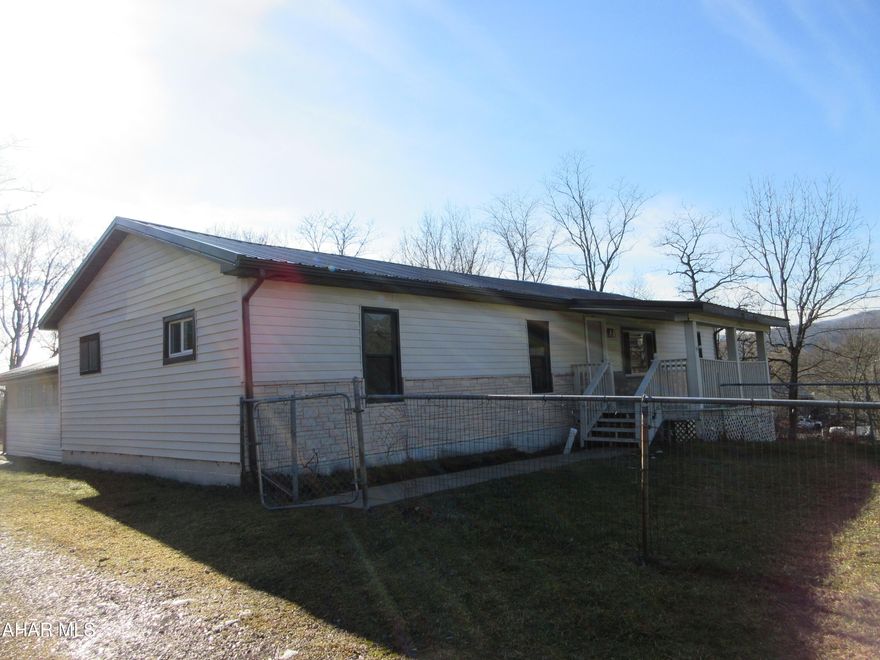 This is a Fannie Mae Homepath.com property. This is a mobile home on a foundation on the Bellwood side of Bell Tip Road. There is an outbuilding for storage beside the house that was used as a small barn. This property has a new roof, oil forced air heating system, carpeting in the bedrooms and panelling in the bedrooms as well. The main floor has a living room, kitchen, dining room, laundry in a closet, full bath and three bedrooms-one with a large closet. There is an unheated enclosed porch on the rear of the house for relaxing or storage and an attached carport for parking. This house is located behind 248 Bell Tip Road with a red outbuilding to the right hand side. This house is ready to move in and be made a home.