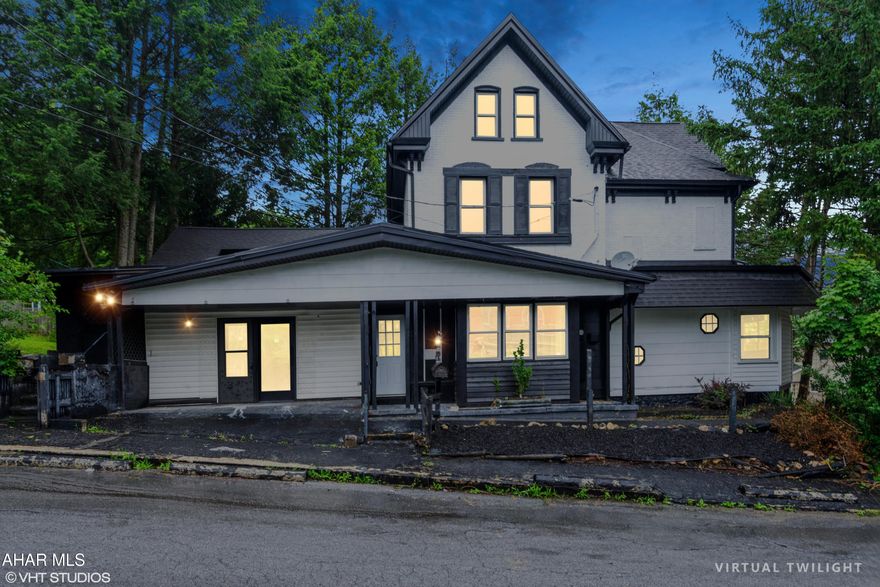 This is a large home in Tyrone on a corner lot. This home has a detached one car garage with storage up top and partially fenced yard. This home sports a new kitchen, all new floor coverings, updates to the bathrooms, paint and a new gas boiler. The main floor has a bonus room, den, kitchen, dining room, full bath and living room. The 2nd floor has two bedrooms, another living room, laundry room, space for a bar or kitchen and full bath. The 3rd floor has three bedrooms. This is an opportunity for a large home in the borough. Make this house your home.