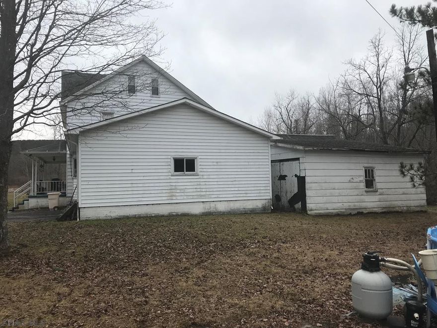 Home has a wild cat septic system. Septic tanks with lines directly to the creek. No options for modernizing. Seller will only accept cash offers. No contingencies on bank financing. Property is in a flood plain. Home is older and ready for updating. Property lines are about 1 foot on both sides of the home. Owner has mowed a larger area. That area is not for sale but may be mowed for useage at this time.