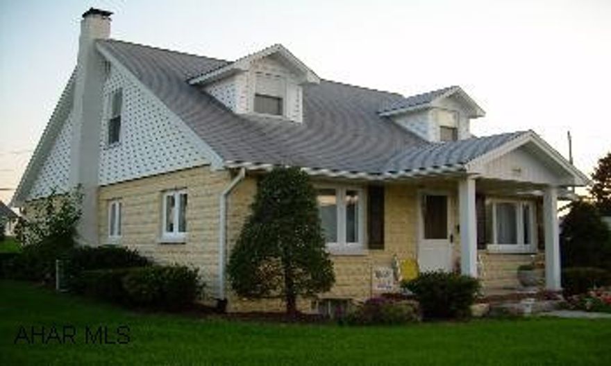 Solid 1.5 story block home on double lot on Walnut Street in Roaring Spring.  2 bedrooms, 1.5 baths. Home has  partly finished basement with central air and 1 car garage. 1.5 story block home on level double lot on Walnut Street in Roaring Spring.  First floor has living room, eat-in kitchen, bedroom and full bath.  Second floor has 1 large bedroom, half bath and attic storge.  Basement has large finished room with remainder being unfinished.  Laundry hook-up currently in kitchen with 2nd set in basement. House has forced air gas heat with central air. Also one car garage and storage shed.  Owner may need delayed possession or a rent-back agrement, depending on closing date.