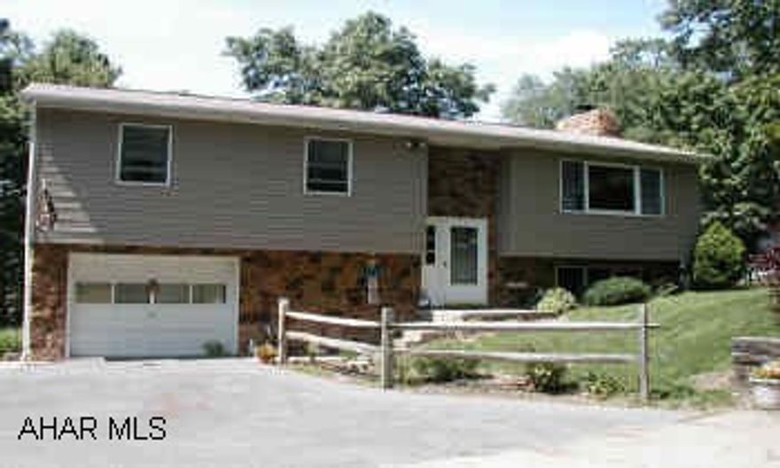 ATTENTION BASKETBALL, TENNIS & VOLLEYBALL LOVERS. LIGHTED FULL BASKETBALL COURT, LIGHTED GAZEBO, FULL ELECTRIC SHED,  & DECK - ALL TO ENJOY IN THE WOODS. SECLUDED YET CLOSE TO EVERYTHING. HEATED SUNROOM IS LARGE & LOVELY.