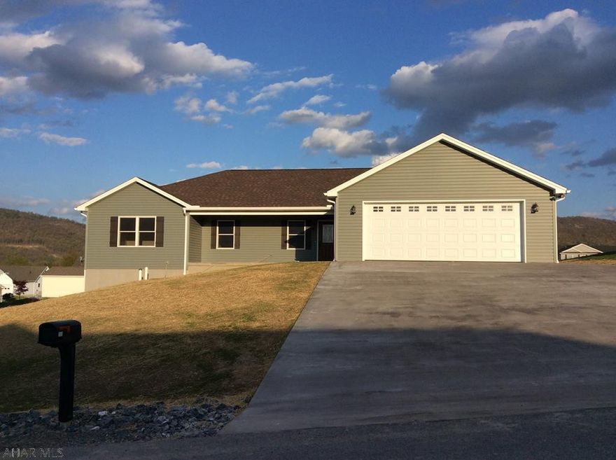 Beautiful custom built 3 bedroom 2 bath home in Spring Cove School district. No expense was spared with this new construction. The master suite is large with a full master bath and walk in closet. Laundry on the first floor makes for convenient living. The full basement is unfinished with a walk out.  Enjoy outdoor entertaining with this large lot. Close to I99 and many shopping areas this home is a must see.