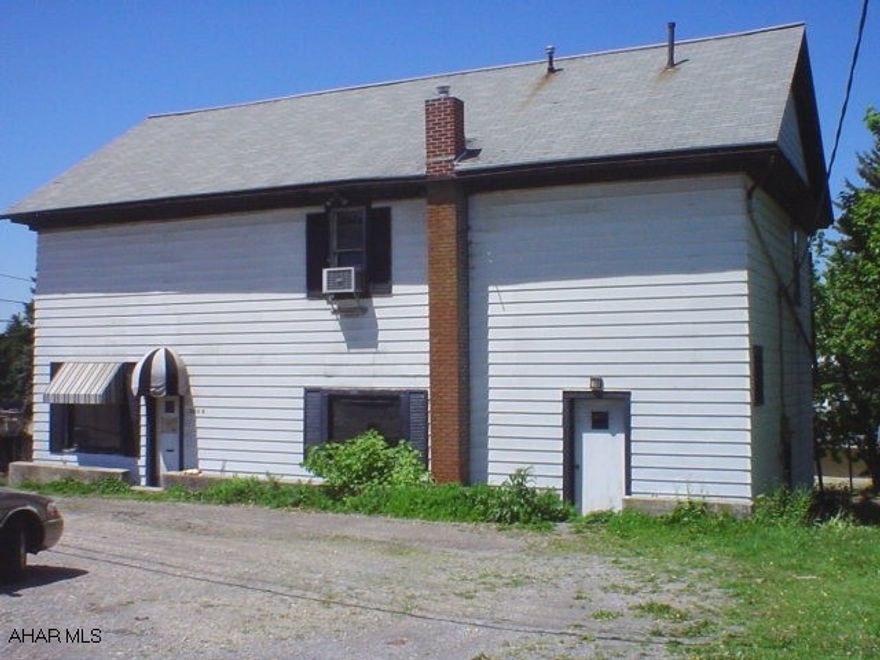 3000 sq. ft. building in great location! New furnace, large open work space, private office, restrooms & storage. Previously used for awning fabrication, zoned highway business.