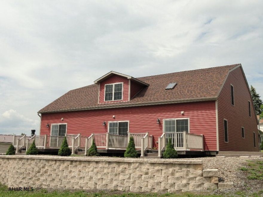 Must see investment property! Newly renovated, completely modernized townhouse building w/3, 2 bedroom units. Large spacious rooms, LR, DR, new modern kitchen, 1.5 BA and 2 bedrooms with walk in closets, deck and covered entrance each unit. Large off street parking area. Convenient location to major highway (I-99) and situated half way between Bedford and Altoona. Only 1/2 mile from the Sheetz Distribution Plant in Claysburg. A tremendous income opportunity. Vacant and move in ready.  Taxes after 2017 accessment have gone down.(est. 3296.00)