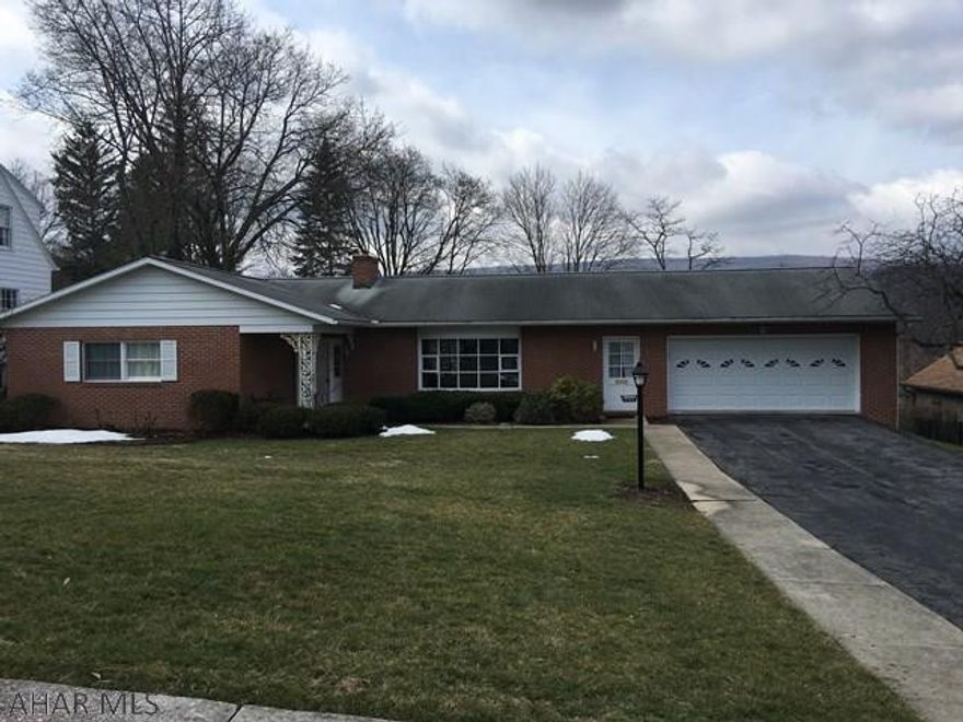 A beautiful well built brick ranch home resting at the top of Juliana Heights. This home is all one floor and no steps.  Brand new Kraftmaid Solid Maple cabinets with soft closing drawers, recessed lighting, high definition laminate countertops with  new appliances and a side by side refrigerator and garbage disposal.  New porcelain flooring in the kitchen and dining area. New carpet in the living room, hallway and bedrooms.  New light fixtures throughout. Freshly painted walls that accent flooring and fireplace. A nice view from the sliding patio door in the dining area. Finished 2 car attached garage with laundry hook-up and access to the backyard.  Updated heat pump and central air and 200 amp electric. Basement has a brick fireplace and full bath with potential of a family rm.