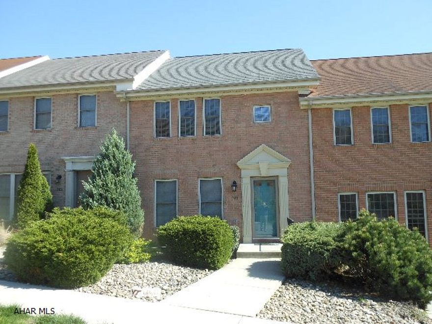 Terrific Townhouse! New bath on main floor. Laminate flooring throughout living room, dining room and kitchen. Finished lower level opening to back patio area with newer tiered retaining garden walls. Off street parking. Enjoy the amenities of Holliday Hills with open spaces and great mountain views from back deck. Stylish and pleasantly decorated.