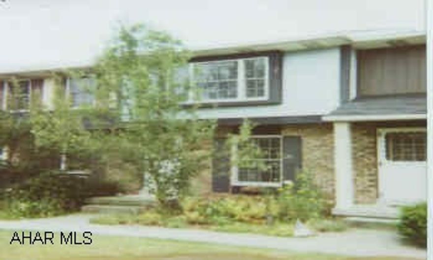 TOP OF HILL ON CEDARCREST DRIVE. LAST ROW OF TOWNHOUSES ON LEFT SIDE.