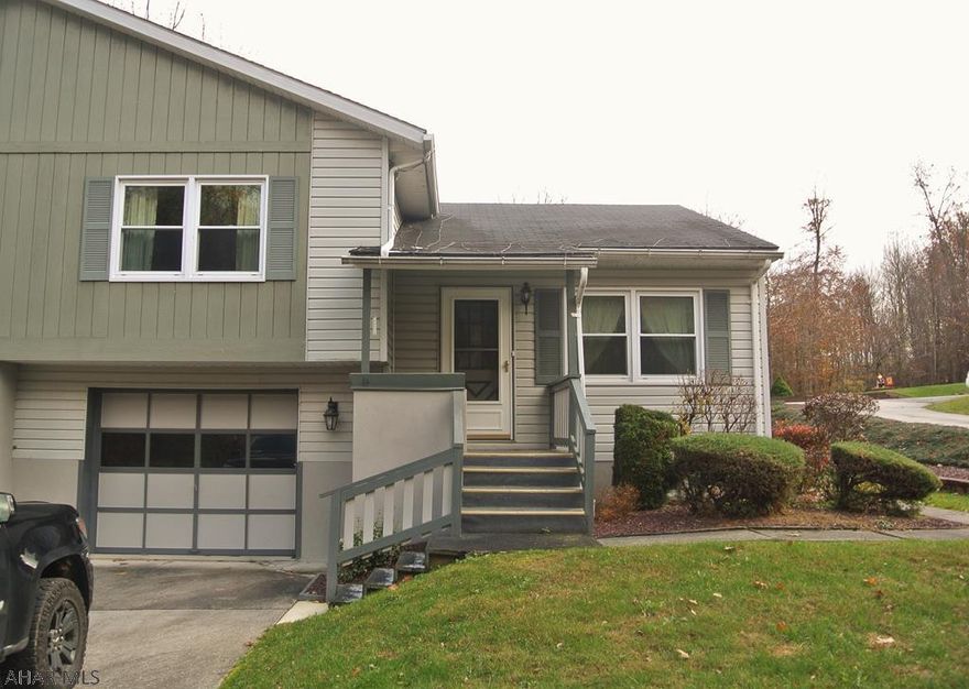 Why Rent when you can buy a very well kept immaculate Half-Double home for less money.   Built in 1988, although much of it is original inside, It has been updated with some of the bigger features, a newer roof, sizeable 3 season sunroom, beautiful landscaping, Central a/c, and more. This home also has very nice size rooms and a huge Lot.  You definitely wont feel crowded.  Get it quick!