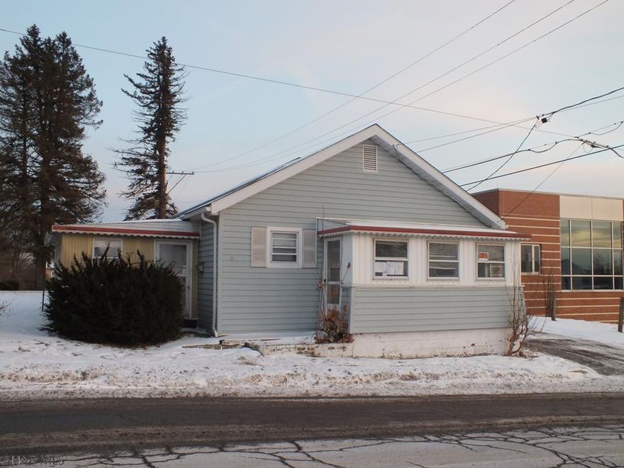 Vinyl 1 story Osceola Mills home in need of TLC. Large living room, first floor laundry and 2 bedrooms. Nice location near schools, town, etc. Large enclosed porch, storage shed. AS-IS sale. Seller will make no repairs
