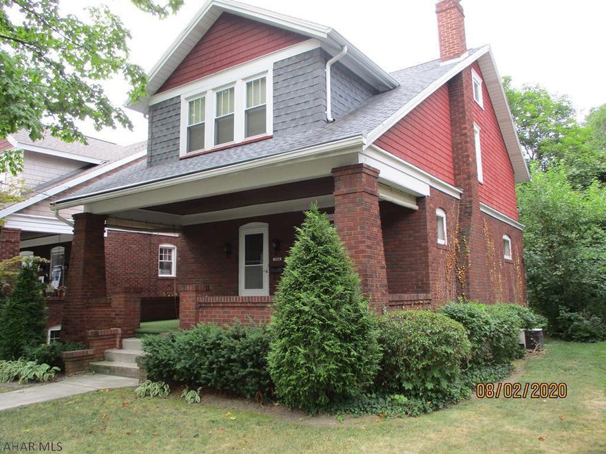 Lovely Llyswen - this classic brick features large, gracious rooms, newer 3/4 bath on first floor, original wood floors under carpeting.  Living room with fireplace to take the chill off the coming fall evenings.  Formal dining room.  Second floor has three large bedrooms, original wood floors and full bath with double vanity sinks..  Walkup to third floor storage area.  Inviting, open front porch.  Newer hot water heater and forced hot air furnace with CENTRAL A/C.  Roof and gutters new in 2015.  Great neighborhood, this quiet street has limited through traffic and is near shopping areas.  Baker Elementary school.  Public transportation nearby.