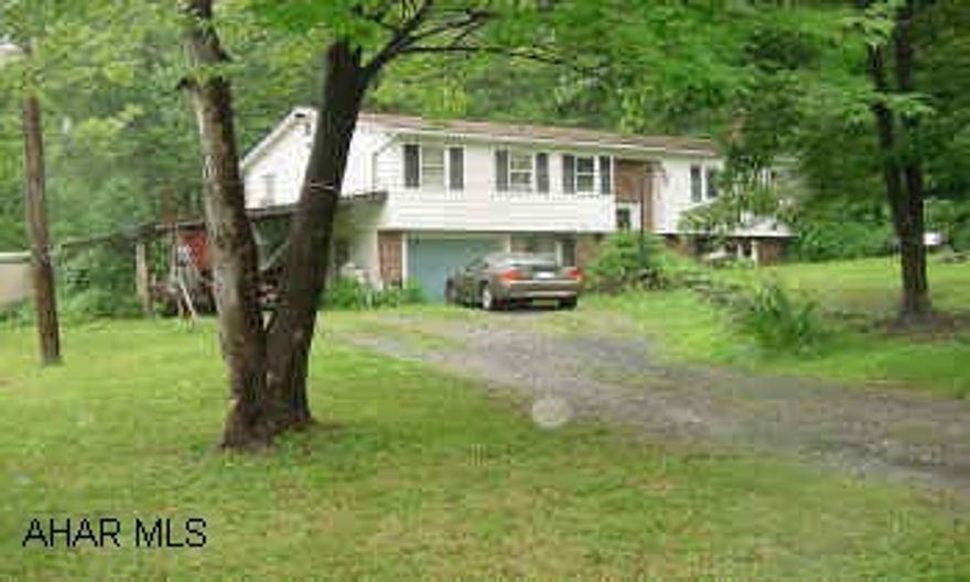 DISTRESSED BI-LEVEL IN A NICE SETTING IN REIGHTOWN BY BELLWOOD. BELLWOOD SCHOOLS. GREAT OPPORTUNITY! "AS IS". DOGS. CALL FIRST. GREAT OPPORTUNITY TO GET IN A NICE LOCATION IN BELLWOOD SCHOOL DISTRICT. DISTRESSED BI-LEVEL NEEDS WORK ON A 100X120 LOT THAT NEWER HOMES SURROUND. 3 BEDROOMS, 3/4 BATH (SHOWER STALL), 1 CAR GARAGE PLUS 1 CAR CARPORT. "AS IS". MIKE MANGIA 932-8888.