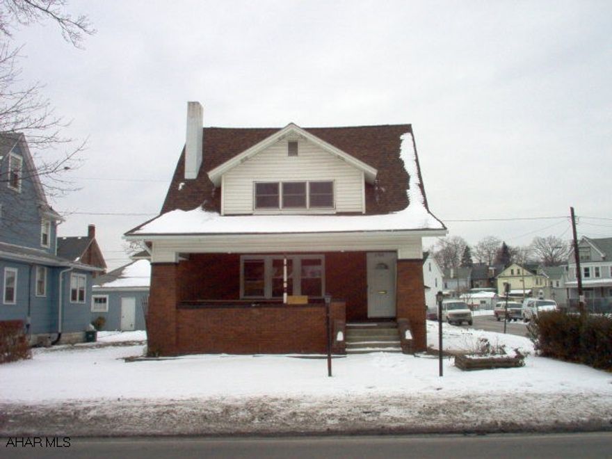 Charming Brick and Frame Two Story, Great Mechanics and ready to move into.  New Range and Dish Washer, New Counter Tops in Eat-In Kitchen with Pantry.  New, Natural Yellow Pine Wood floors in Living and Dining Rooms. Living Room featuress a fireplace with book cases. Large Garage on Corner Lot.   Fireplace is wood burning, and would need to be inspected before using.