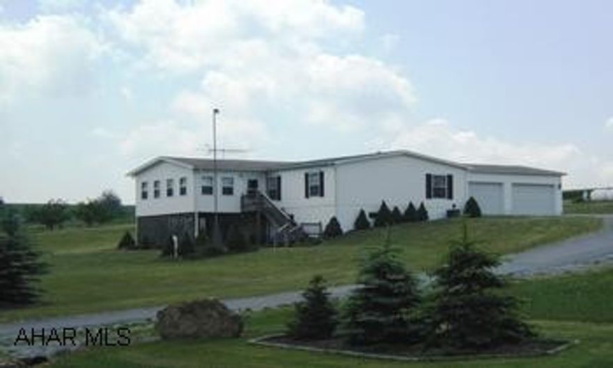 Lovely 1 Story modular with split floor plan, full basement, sun room, covered patio, large metal out building, 1.76 acres approx. Two heating systems - Propane main floor, oil basement.  Back up generator for electrical system, stove, refrigerator, and counters in basement stay.