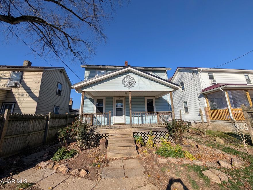 Sproul/Claysburg area 2 story vinyl home is perfect for handypersons or investors. First floor features large living room w/ ornamental FP, formal dining room, updated kitchen, first floor laundry and full bath. Second floor with 4 bedrooms and half bath. Relaxing covered front porch and rear enclosed porch/shed. Needs some TLC, but loads of potential with your imagination. Property failed pressure test on plumbing.