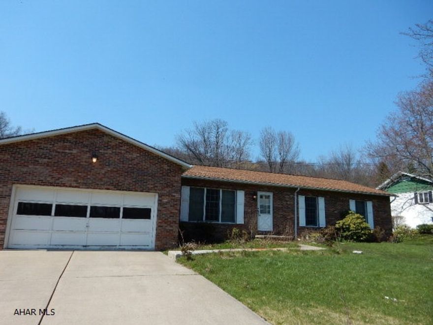 Ranch 3 bedroom, 2 bathrooms, living room with fireplace, dining room, eat-in kitchen with all appliances. Full basement, 2 car garage. lot .85 acres goes clear to the road behind property,  possible subdivision for additional building lot.