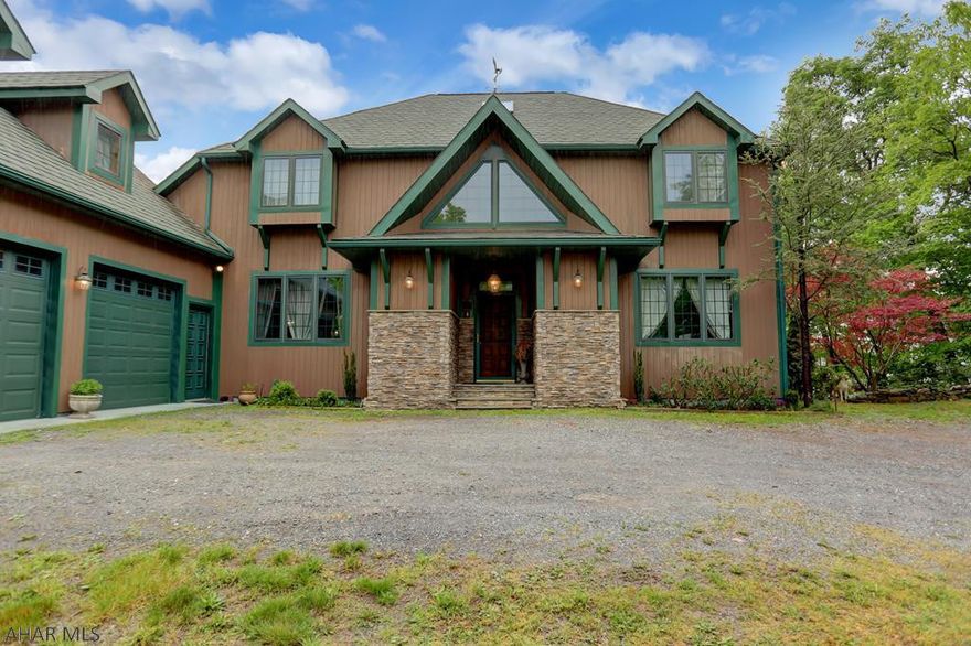 Incredibly beautiful home with great views of Lake Raystown - from the hot tub on the top deck you can see 11 miles!  Eagles, deer, turkey, bear, and lots of other wildlife here. Five minutes to Shy Beaver boat launch or 15 minutes to Raystown Resort. Versatile property - can be a residence, vacation rental, or both - the lower level has a separate entrance. This home has many upgrades - 9' ceilings, cherry hardwood floors, 5 skylights, steam showers, Jacuzzi, 3-level deck, Waterford crystal chandelier in DR, dentil & etched moldings, Kohler baths, faucets, sinks. Studio on 3rd floor. Lower level has finished family room with kitchenette, bedroom, bath, wine cellar, storage, unfinished bonus room.  2.5 bay garage w/storage above. Two zone AC-5 ton, 3 ton. 400 amp service. And much more!