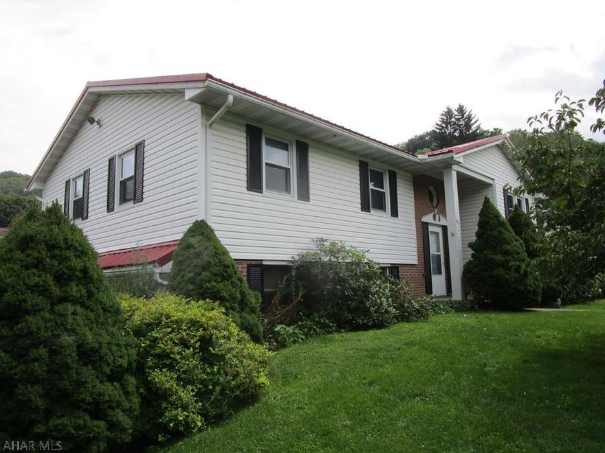 Bi-level home offering 3-beds, 2-baths, living room, kitchen & dining room on the main level.  Full walk-out basement with a rec room, laundry room & two-car integral garage.  Heat pump with central air, electric radiant ceiling heat, wood stove & 200-amp electric.  Nice lot & location, black top driveway & storage shed.  This could be a very nice home with some updating!!!!