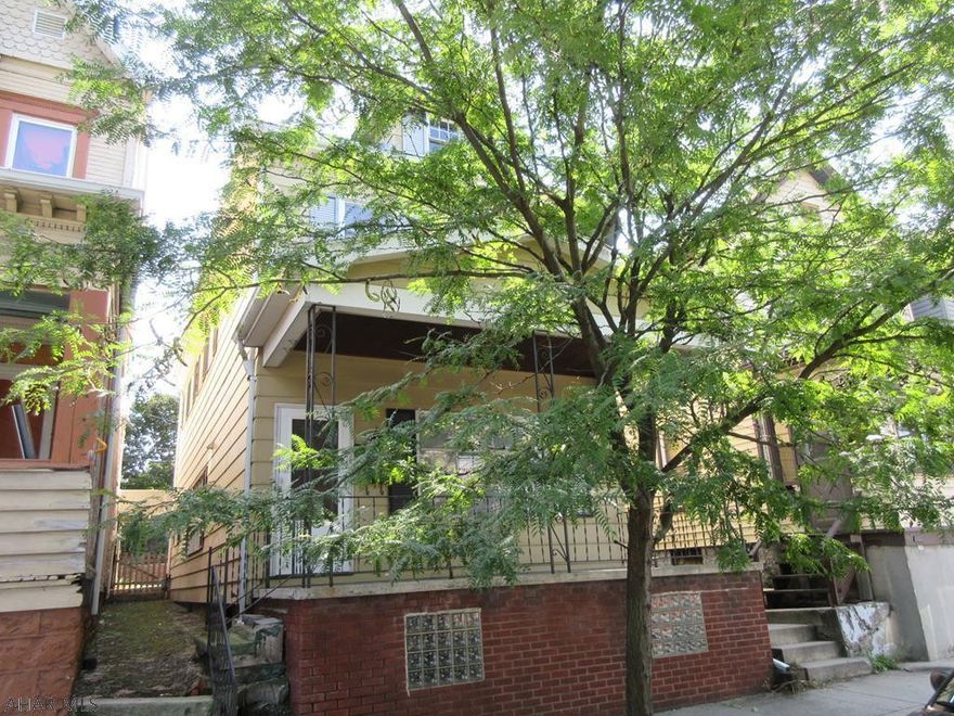 Altoona 2 story home with convenient, in-town location close to everything. Needs some TLC, but large living room with ornamental FP and huge, open kitchen with dining area and 1/2 bath all on the first floor. Large covered concrete rear porch and adjoining patio plus covered front porch for lots of outdoor living space. Off-street parking could easily be created in back yard off rear alley. Property sold AS-IS. Seller will make no repairs. Offers must be submitted through HUD approved broker. Buyer pays both transfer taxes. Equal Housing Opportunity.