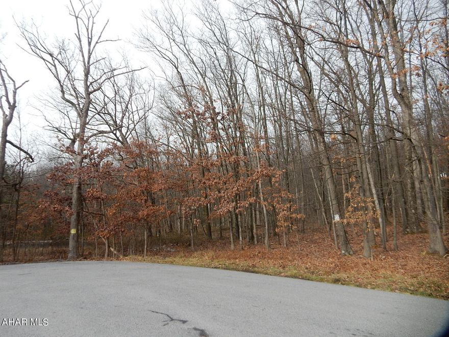 Exciting development site or for single estate type property! Exceptional rolling topography makes for a great subdivision. 31.66 Acres of vacant ground located between Sylvan East and Stonehedge.