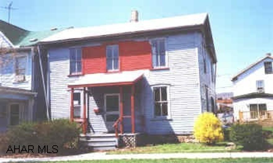 Redone inside, will be painted on outside. Some replacement windows, L shaped lot, newer oak cabinets, updated bathroom. Lot size is irregular.