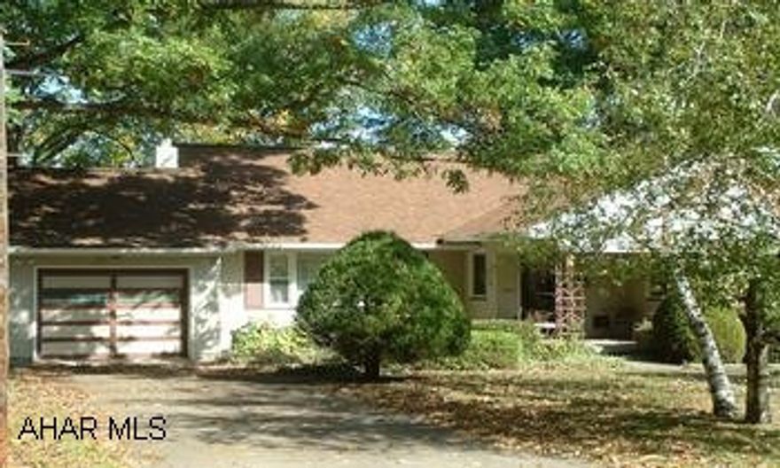 Fantastic house on great corner lot near Campus! New roof, furnace and windows - large BR's , walk-up attic, family room with fplace in basement, great closet space, 2 separate garages - 1 at front & 1 underneath at rear/2 deep.