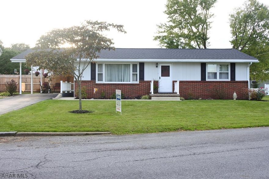 Very well maintained Ranch style home close to the Campus.  Corner lot, carport/patio...could be enclosed if you needed a garage. Beautiful hardwood floors have been lovingly preserved.  Central air has recently been added for comfort on hot Summer nights.  There is a dining area in the living room, but the layout could be reconfigured for a formal dining room using one of the bedrooms.  The lower level has a carpeted family room and a bonus room...lots of storage, too!