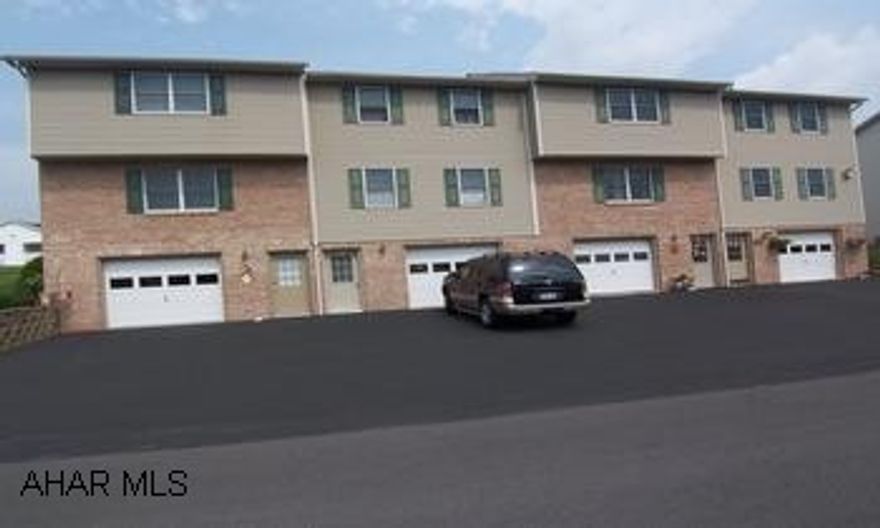 Nice Townhome with all Large Rooms.  One Full Bath & 2 Half Baths.