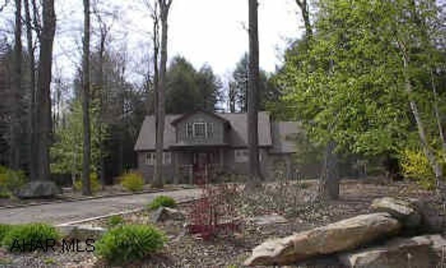 AWESOME 1-1/2 STORY CONTEMPORARY NESTLED IN THE PINES!  BALCONY BRIDGE OVER GREAT ROOM.  IMMACULATE. SCREENED OR GLASS ENCLOSED 3 SEASON ROOM.  PROFESSIONAL LANDSCAPE. CALL DARLA 934-4663. HOME WARRANTY!  AWESOME FLOOR PLAN.  GREAT 3 SEASON ROOM.  VERY PRIVATE.  IMMACULATE OPEN LOFT AND BRIDGE TO WINDOW SEAT.  NEAR STATE PARKS, LAKE AND STATE GAME LANDS.  COMMUNITY POOLS AND TENNIS COURTS.  GATED COMMUNITY.  CALL DARLA 934-4663.