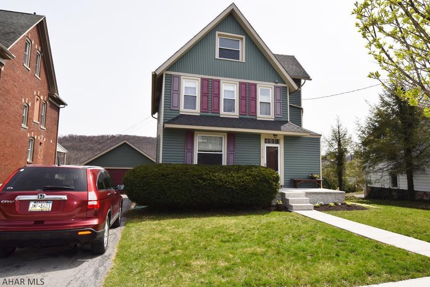 This beautiful home is on my favorite street in Hollidaysburg!  You will love the new kitchen with farm sink, center island, stainless steel appliances, and hardwood floors.  New hardwood floors have also been installed in the living room and dining room.  The large mud room catches all the kid and pet gear as they come in the back door.  First floor laundry with all new plumbing.  Convenient first floor half bath.  Master bedroom has walk-in closet and sitting area.  Rear deck, new front porch, and sidewalk.  Good mechanics and replacement windows.  Great big yard and raised garden.  You'll love being able to walk to all the fun borough festivals and parades.  This home is truly a great find in the borough.