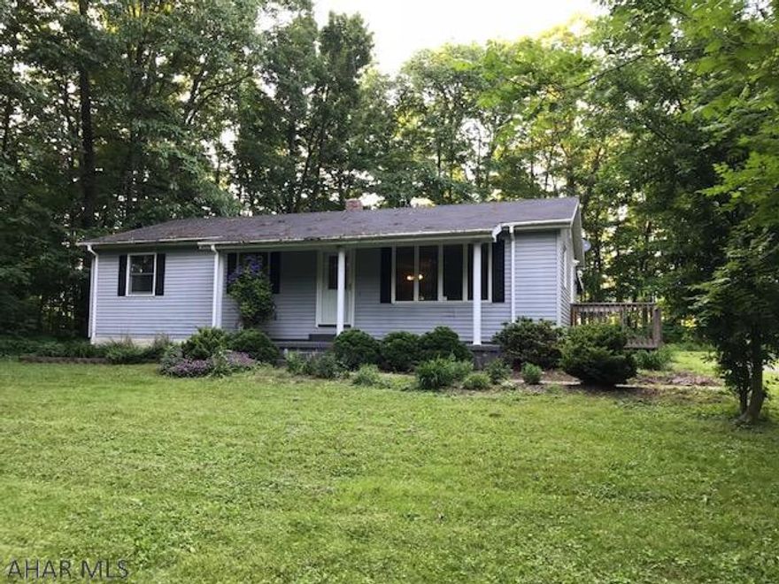 Really nice setting for this 3 bedroom ranch on 1.6 private acres.  Covered deck runs the entire length of house.  Full unfinished basement has tons of possibilities.  Nice oak eat-in kitchen.