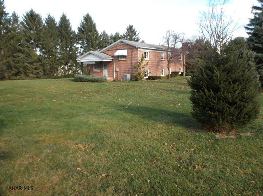 Additional lot (156 x 150) at corner available for $59,900 will add an extra half acre to your lot size.  Spacious 4 level split with one car integral garage and detached 2 car garage.  Lowest level has storage room, woodburner, newer hot water tank, and GHWBB furnace.  Covered side porch.  Sale includes rider mower with plow and 2 lawn mowers.