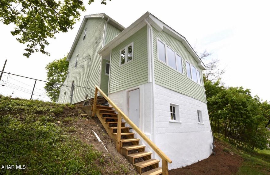 Totally remodeled 3 bedroom, 2 bath home.  First floor features  eat-in kitchen, dining room, living room, full bath and three season enclosed sun porch with tons of natural light.   The second floor has three very nice size bedrooms and full bath.   Home has newer floor coverings, replacement windows, central air, new roof in 2025, and vinyl siding.   There is off street parking in the rear for three vehicles.  Plenty of space to build a garage.  The yard is spacious for kids and pets.   Don't miss this opportunity for homeownership at an affordable price.