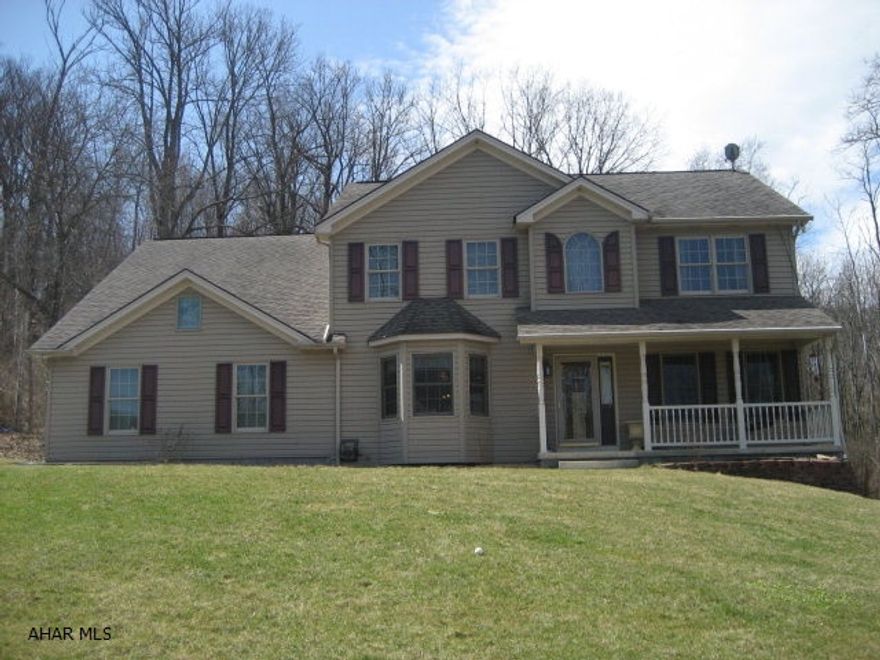 This custom built, 2 story Colonial style home is secluded on 3.32 acres, yet minutes from downtown historic Hollidaysburg.  Open concept kitchen, dining room, living room great for entertaining. Kitchen is spacious with island and an abundant cabinet space.  Living room features 17ft ceilings with stone, wood fireplace, open to 2nd floor.  Master bedroom with walk in closet, MB bathroom features Jacuzzi style tub, separate shower, double sinks.  Heated above ground pool with maintenance free deck.  Call for your viewing today!