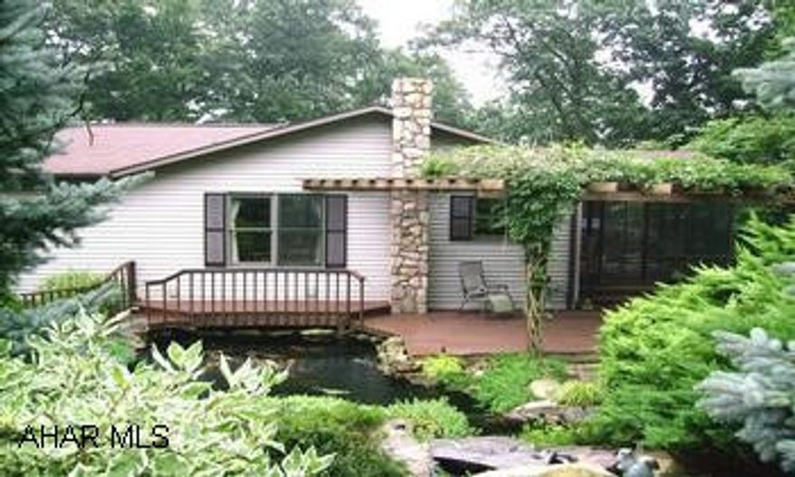 2 BD CONTEMP W/ 2 CAR INT & DET 2 C GARAGE.  SCENIC SETTING FOR THIS LUXURY 2BR. LISTEN TO  WATERFALLS & SCENIC PONDS FROM  SCREENED PORCH IN  SUMMER.  FLOOR TO CEILING WINDOWED WALL IN GREAT ROOM. OPTION TO BUY 3RD ACRE. 1ACRE & HOUSE $155,000. 2 BD CONTEMPORARY W/ 2 CAR INTEGRAL GARAGE & DET 2 CAR STORAGE GARAGE. BEAUTIFUL BRIARWOOD. SCENIC SETTING FOR THIS LUXURY 2 BEDROOM CONTEMPORARY. LISTEN TO THE WATERFALLS AND SCENIC PONDS FROM THE SCREENED PORCH.FLOOR TO CEILING WINDOWED WALL IN GREAT ROOM.  ADDITIONAL ACRE AVAILABLE. OPTION TO PURCHASE 3RD ACRE.  HOUSE WITH ONE ACRE $155,000.