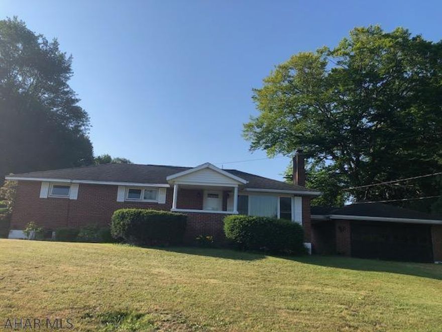 3 BR Brick Ranch home with breezeway leading to a 2 car garage. Hardwood floors throughout. Finished basement with lots of room. Large bar in family room. Bring your ideas to this home. Some updates will make this a beautiful home. All new windows throughout.