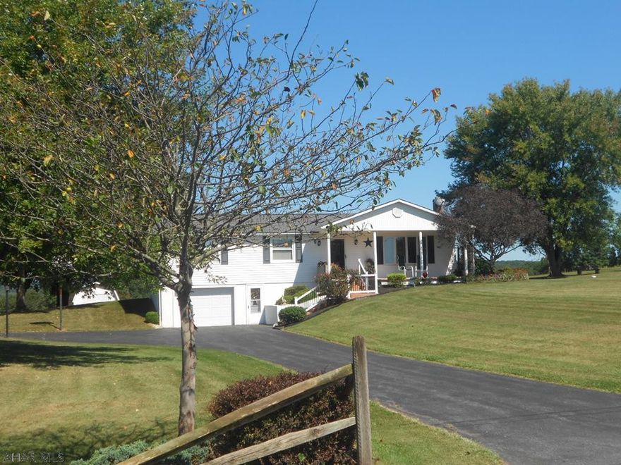 Lovely Ranch home on 1.722 acres. Just what everyone is looking for, 3 bedrooms, 1 full and 1 half bath. Nice size living room with Bay window, open kitchen, dining area with lovely new flooring through out. Inviting Sunroom off the Dining room for relaxing. New appliances, main level laundry for added ease. All windows have been replaced and a new roof recently put on entire home. Outside features a detached 2 car garage, outside shed and easy care yet beautiful landscaping. Views of the mountain and country side are breath taking. Call to see this one owner home!