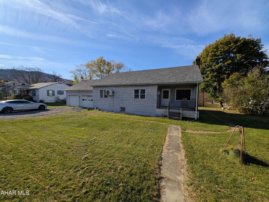 2 bedroom ranch home on approximately 1.5 acres! This home has a large eat-in kitchen with an adjacent room that could be a formal dining room.  Washer and dryer hook-ups on the main level.  The home features 2 mini-split units - one in the living room and one in one of the bedrooms and a brand new roof (replaced on 10/25/24).  The full bath is conveniently located right next to the bedrooms.  There is a full basement with plenty of storage space.  A 2 car garage completes this great property!