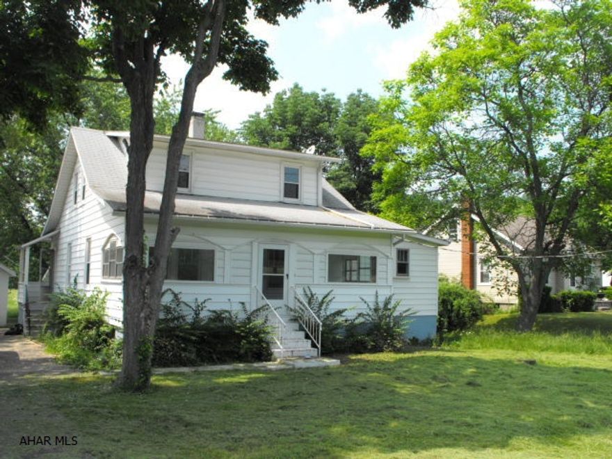 Charming 1 1/2 story with modern kitchen & baths. 2nd fl bath has spa shower with whirlpool tub. Large garage with workshop. Level & cleared 1 acre.  as is where is sale