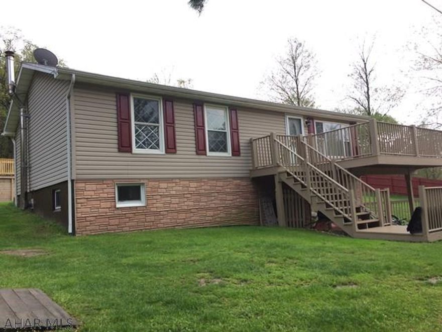 Well maintained 3 bedroom raised ranch located in Portage School district. Beautifully updated full bath, new coal stove, new hot water heater, if you like outdoor living the is the one for you. Stocked trout stream in front of the house and close to all 4 wheeler trails. Entertain family and friends in the back yard with new retaining wall area and spacious deck.