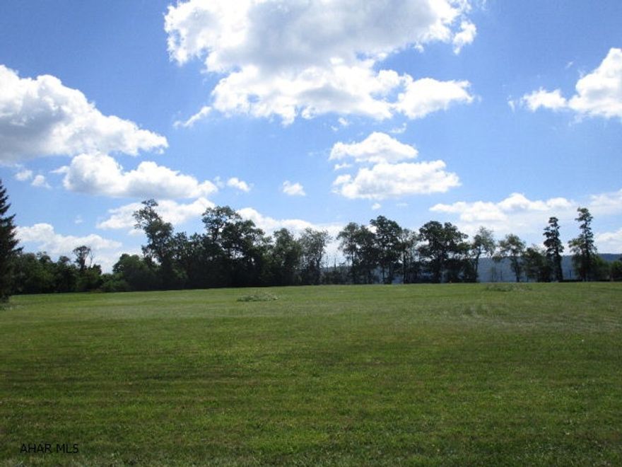 1.4 acre lot that is all open.  Good views of the surrounding countryside.  Land has been perc tested and approved for a private sand mound system.  Great place to build your new home!  Sale is contingent upon township and county planning commission subdivision approval.  All final paperwork has been submitted to them for approval.