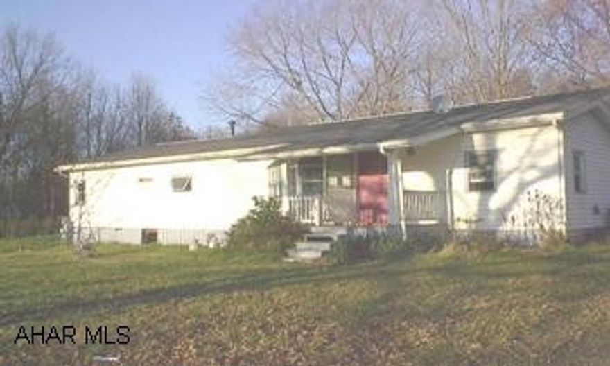MOBILE HOME WITH LARGE ADDITION. UPDATING AND FINISH WORK NECESSARY. NO ELECTRIC.  SEPTIC ISSUES.  AS IS ADDENDUM. MOBILE HOME WITH LARGE ADDITION.   NICE 1 ACRE LOT IN WOODED SETTING.  NEEDS WORK. AS IS ADDENDUM. BRING OFFERS.  CALL DARLA 934-4663