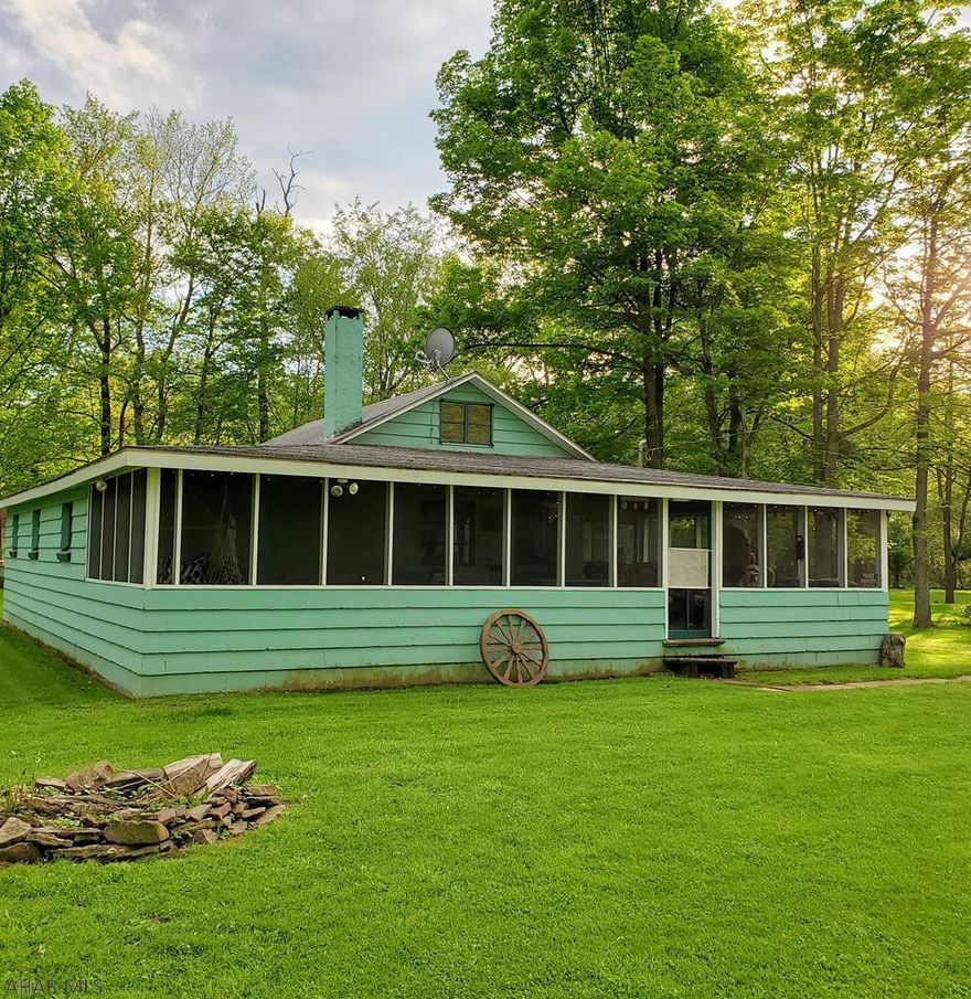 Welcome the nicer weather from the back deck, or gather with family and friends in the screened in porch. Either way you'll want to watch the sunset over Dunnings Creek which meanders behind the property. This is a very clean cottage that you can start staying at immediately! Well built cement block structure with 3 bedrooms and 1 bath. 2 fire pits outside amp up the entertainment factor making this cottage a must see if you're looking for a vacation spot in a beautiful setting! Did I mention the home is sitting on 3 lots...lots of room to spread out at your home away from home.